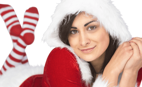 Smiling woman in santa outfit with striped socks embracing festive spirit
