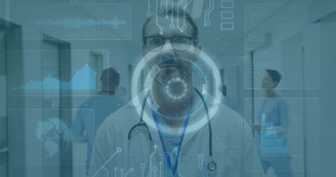 Doctor presenting virtual interface in hospital corridor