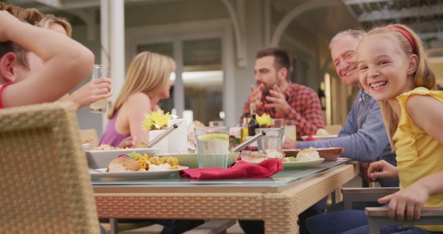 Happy Family Enjoying Dinner Outdoors Together - Download Free Stock Images Pikwizard.com