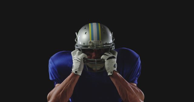 Focused American Football Player in Helmet and Uniform - Download Free Stock Images Pikwizard.com