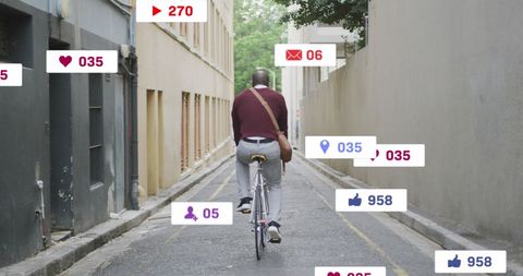 Digital connectivity: man biking in urban environment