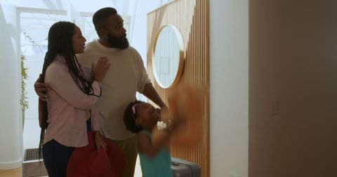 Family entering holiday apartment with excitement and anticipation