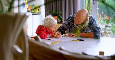 Father teaching daughter drawing creativity bonding parenting