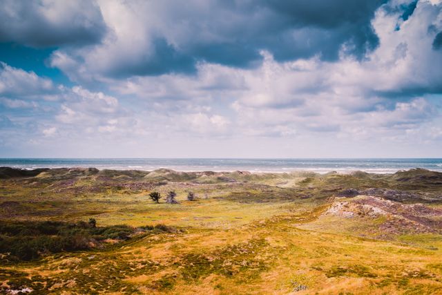 Vast Coastal Landscape With Dramatic Clouds Overhead - Download Free Stock Photos Pikwizard.com