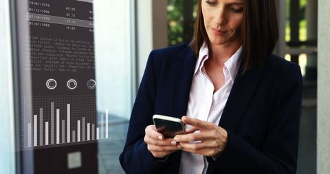 Businesswoman Managing Financial Data on Smartphone