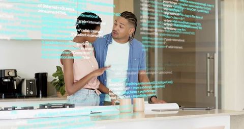 Couple Discussing Smart Home Project at Kitchen Island with Digital Code Overlay