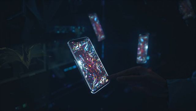Futuristic transparent phone with multicolor holographic display