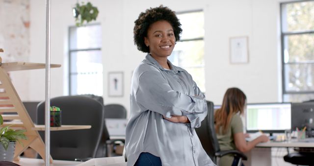 Happy African American Casual Businesswoman Smiling in Modern Office Environment - Download Free Stock Images Pikwizard.com