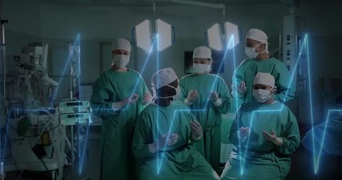 Diverse Surgeons Using Digital Data in Operating Room - Download Free Stock Images Pikwizard.com