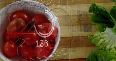 Displaying bowl of cherry tomatoes with futuristic hud overlay on wooden cutting board
