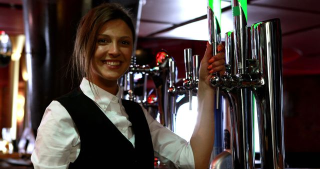 Smiling Bartender Working at Bar Counter in Pub - Download Free Stock Images Pikwizard.com