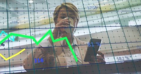 Businesswoman analyzing prospects with data visualization