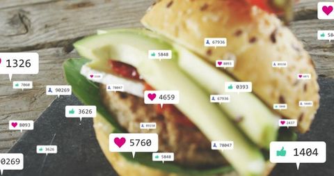 Overlaying social media reactions on gourmet avocado burger closeup for marketing