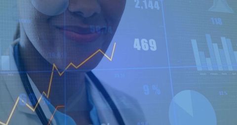 Female clinician reviewing healthcare data visualization with stethoscope and dashboard