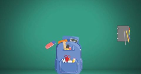 School supplies arranged with green chalkboard background