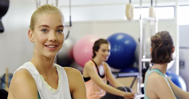 Fitness Class for Women Focusing on Strength Training with Exercise Balls - Download Free Stock Images Pikwizard.com