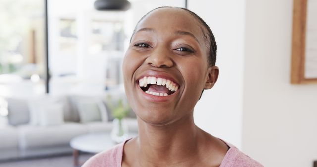 Joyful Woman Laughing at Home - Download Free Stock Images Pikwizard.com