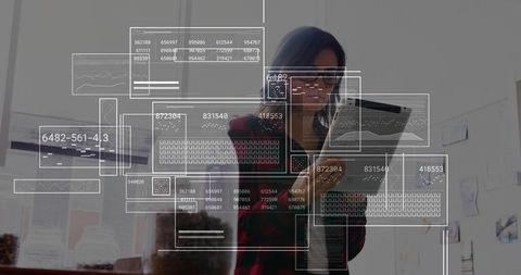 Innovative Businesswoman Engaging with Augmented Data Displays Indoors