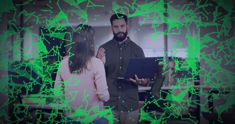 Colleagues Collaborating on Network Data with Digital Overlay in Modern Office