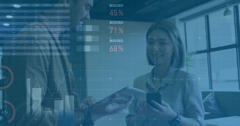 Business Colleagues Analyzing Financial Data in Office Setting - Download Free Stock Images Pikwizard.com