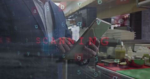 Businessman Scanning Data in Restaurant with Digital Tablet Technology