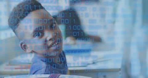 Student Engaging with Digital Code in Innovative Classroom