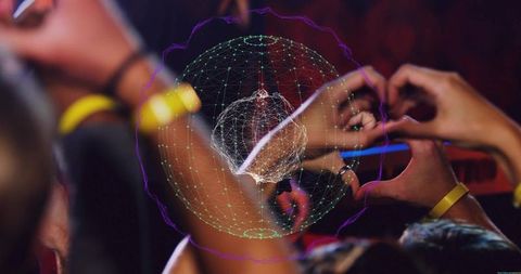 Concert crowd making heart gesture with smartphone and holographic network sphere