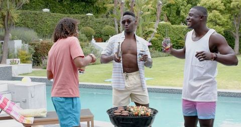 Friends Enjoying Outdoor Barbecue by Pool in Summer - Download Free Stock Images Pikwizard.com
