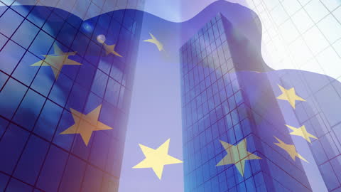 European Union Flag Reflecting on Corporate Skyscrapers