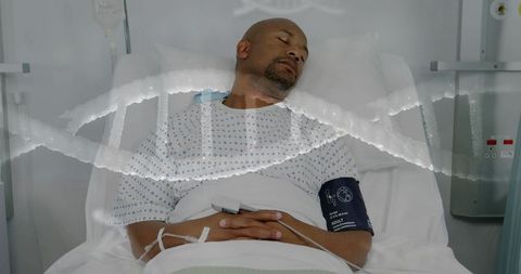 Patient resting in hospital bed with dna strand overlay representing precision medicine