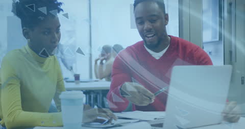 Innovative Business Colleagues Utilizing Technology in Modern Office