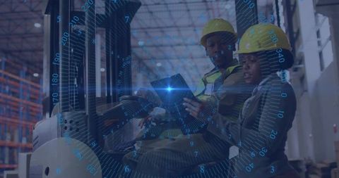 Warehouse workers collaborating with digital tablet and data overlay