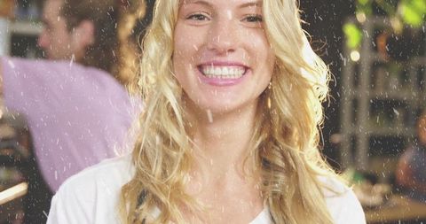 Cheerful Barista in Snow-like Atmosphere Inside Cozy Cafe