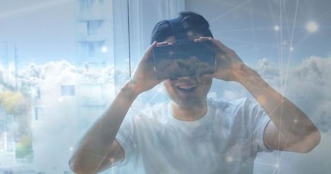Man Thrilled Using VR Headset at Home - Download Free Stock Images Pikwizard.com