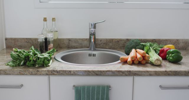 Modern Kitchen Counter with Fresh Vegetables and Stainless Steel Sink - Download Free Stock Images Pikwizard.com