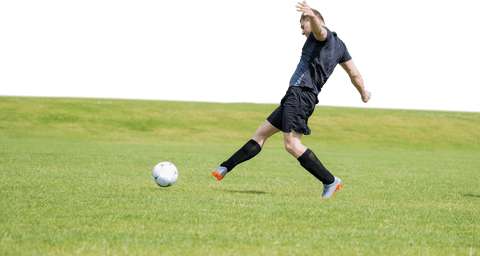 Athlete in Action Kicking Soccer Ball on Transparent Field - Download Free Stock Videos Pikwizard.com
