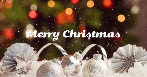 Elegant Christmas Decorations with Falling Snow - Download Free Stock Images Pikwizard.com