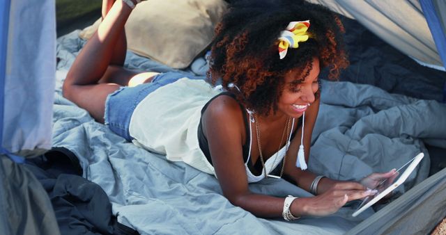 Young Woman Relaxing in Tent Using Digital Tablet During Camping Trip - Download Free Stock Images Pikwizard.com