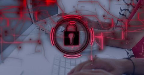 Hands typing on laptop keyboard with red cybersecurity padlock overlay protecting data