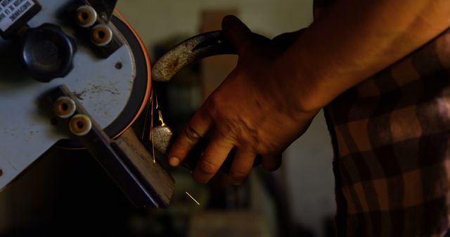 Close-Up of Metalworker Grinding Metal with Sparks - Download Free Stock Images Pikwizard.com