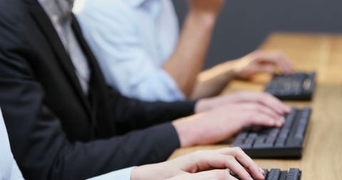 Business Professionals Typing on Keyboards in Conference Room - Download Free Stock Images Pikwizard.com