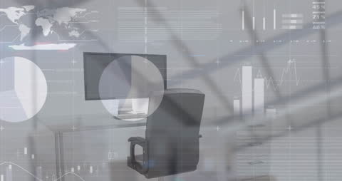 Office Desk with Computer Showing Financial Data Analysis