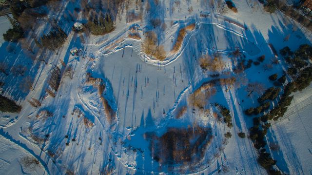 Aerial View of Winter Landscape with Shadows and Snow - Download Free Stock Photos Pikwizard.com