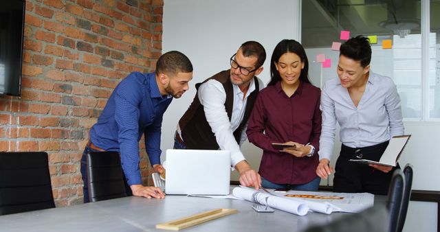 Diverse Team Collaborating in Modern Office Space, Professionals Working, Teamwork, Business Concept - Download Free Stock Images Pikwizard.com