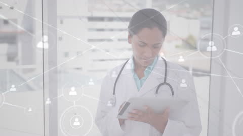 Doctor Using Digital Tablet with Connection Network Overlay