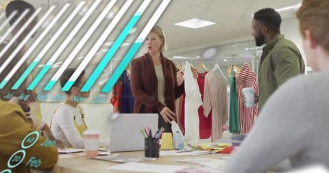 Fashion team presenting white dress during collaborative showroom design meeting