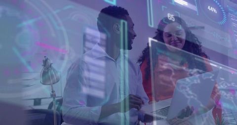 Colleagues Analyzing Data with Holographic Dashboard Animation