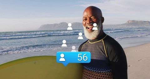 Senior Surfer Engaging with Social Network on Beach