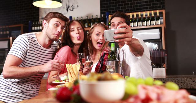 Friends Taking Selfie in Trendy Cafe While Enjoying Food and Drinks - Download Free Stock Images Pikwizard.com