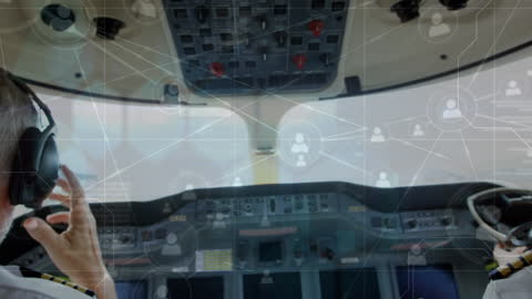 Pilots in Cockpit Using Advanced Aviation Technology